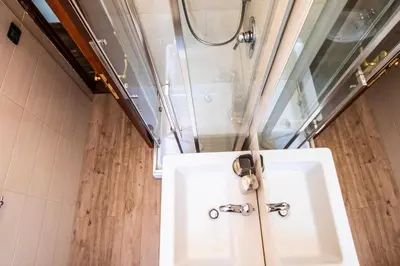 a bathroom with a sink and a shower at La Vite 94 in Rome