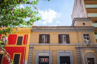 an old building with a tower on top of it at Furio Camillo in Rome