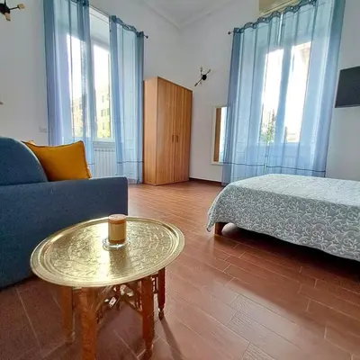 a living room with a couch and a coffee table at Residenza San Pietro in Rome