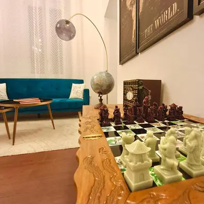 a living room with a chess table and a couch at Residenza San Pietro in Rome