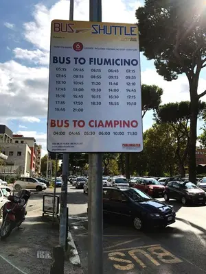 a bus to financing sign in a parking lot at Appartamento Remanton in Rome