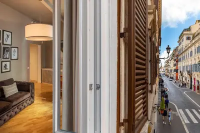 a view of a street from a window in a building at Piazza di Spagna Moda Luxury Apartment in Rome