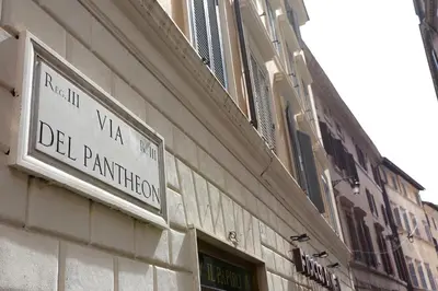 a street sign on the side of a building at Maddalena 6 - Pantheon in Rome
