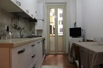 a kitchen with a sink and a counter top at Rhome202 in Rome