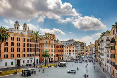 a view of a city street with buildings at Spagna Luxury Rooms in Rome