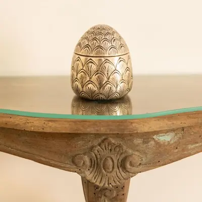 a vase sitting on top of a glass table at Classic Flat Monti in Rome
