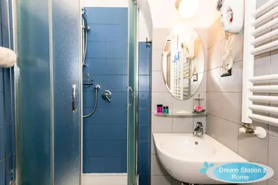 a bathroom with a shower and a sink at Dream Station 2 in Rome