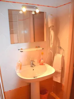a bathroom with a sink and a mirror at Aracoeli in Rome