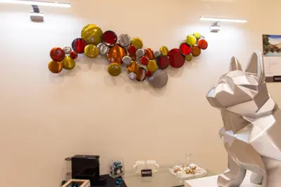 a wall with a bunch of balloons on a wall at Prati 25.7 Suites in Rome in Rome