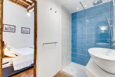a bathroom with a shower and a sink at LIVING COLOSSEUM in Rome