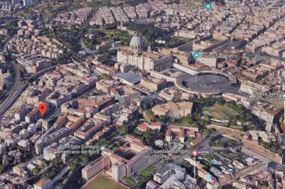 an aerial view of a city with a red marker at GuestHouse near St.Peter in Rome