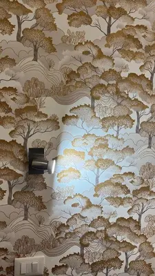 a wallpaper with trees and clouds on a wall at TIBURTINA INN GUEST HOUSE in Rome