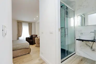 a bathroom with a shower and a sink in a room at Relais Aquarium in Rome