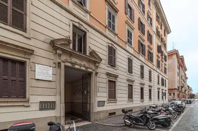 a group of motorcycles parked next to a building at GuestHost - Piramide & Testaccio Design Flat in Rome