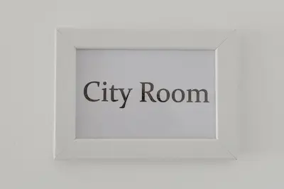 a city room sign with the words city room at Voyager House Termini - Home and More in Rome