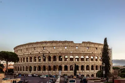 a large building with cars parked in front of it at Leone in Rome