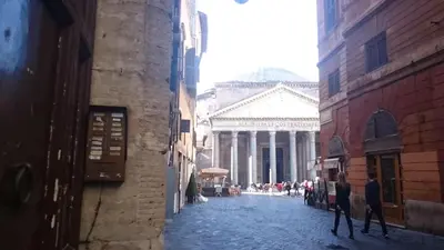 a city street with a building in the background at Al Pantheon Con Thomas Mann in Rome