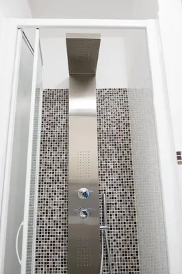 a shower in a bathroom with a glass wall at Da Merion in Rome