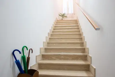 a stairway with a railing and a stair case at Da Merion in Rome