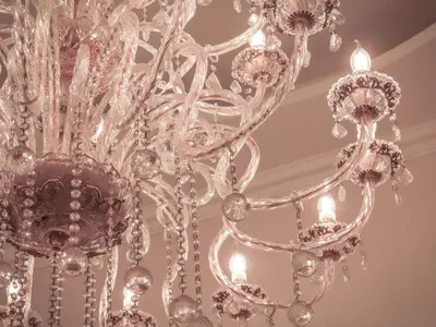 a large glass chandelier hanging from a ceiling at My Maison 70 Guest House in Rome