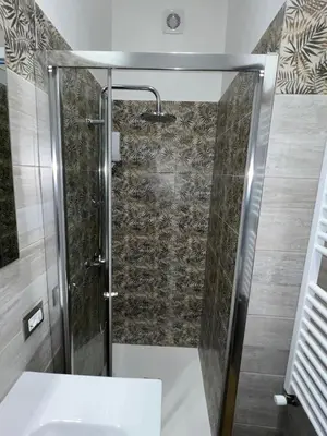 a bathroom with a shower and a sink at Laura luxury apartment in the center Rome in Rome