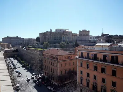 an aerial view of a city with buildings and cars at Vatican Rooms Irene in Rome