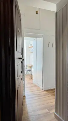 a room with a desk and a tv and a bed at The Rica House in Rome