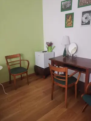 a room with a desk and two chairs and a table at Home 103 in Rome