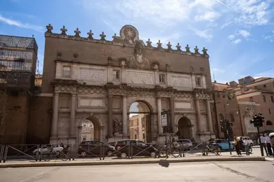 an old building with cars parked in front of it at Roof top magic Piazza del Popolo in Rome