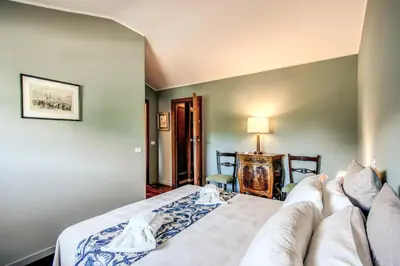 a bedroom with a bed and a couch at Roof top magic Piazza del Popolo in Rome