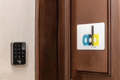 a door with an open sign on it at Ada Rooms in Rome