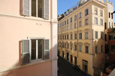 two buildings next to each other on a street at Boschetto Monti Apartment in Rome