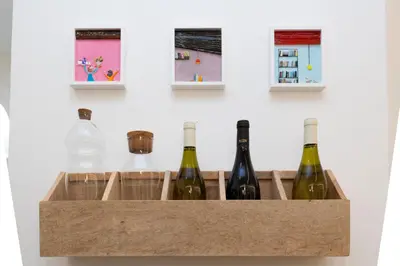 a wooden box filled with bottles of wine at B & Bea in Rome