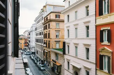 a view of a city street with buildings at A World Aparts - 55 Palermo in Rome
