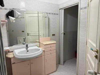 a bathroom with a sink and a mirror at Home of Joy - Vatican in Rome