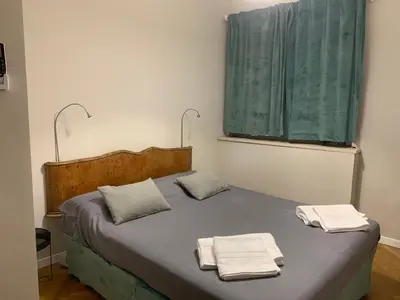 a bedroom with a bed with two towels on it at B&B Nonna Marcella in Rome