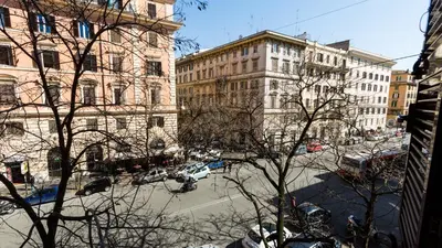 a view of a city street with cars and buildings at Rest Guesthouse in Rome
