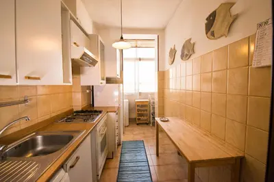 a kitchen with a sink and a counter top at Appartamento 2 in centro a Roma in Rome