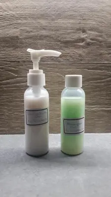 two bottles of soap sitting next to each other at Arc Trilussa 44 in Rome