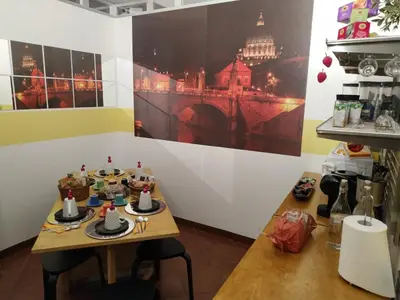 a room with a table with cakes on it at B&B Claudia a Monteverde in Rome