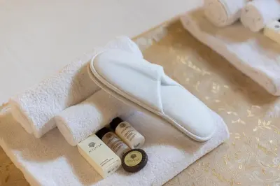 a white shoe sitting on top of a towel at Leonardo Suite Pantheon in Rome