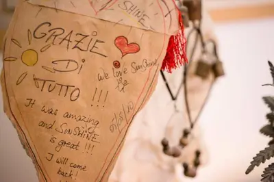 a doctors stethoscope hanging on a wall with writing at SUNSHINE HOSTEL in Rome