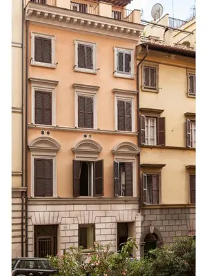 a large building with many windows on it at Rasella Suites 47 in Rome