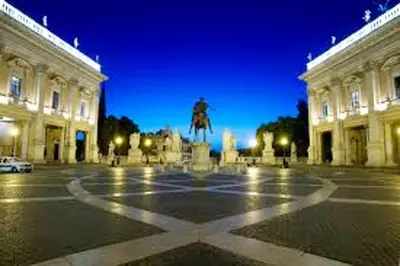 a building with a statue in the middle of a courtyard at Comfortable Apartment in the Heart of Rome, 65m², City View in Rome