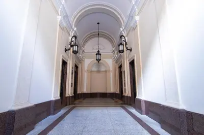 an empty hallway of a building with a ceiling at Deluxe Suite Welness in Rome