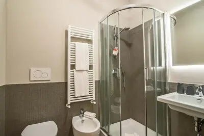 a bathroom with a shower and a toilet and a sink at The Pantheon Eyes in Rome
