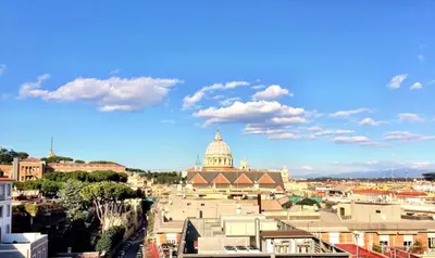 a view of a city with a building with a dome at Casa Alberto in Rome