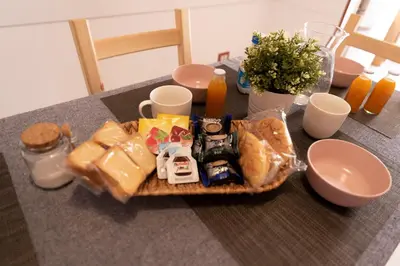 a table with a tray of food on a table at The Good Place B&B in Rome