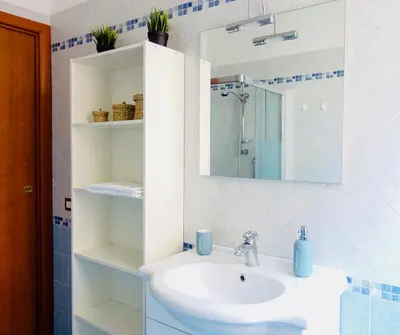 a bathroom with a sink and a mirror at The Good Place B&B in Rome