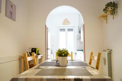 a dining room with a table and a window at The Good Place B&B in Rome